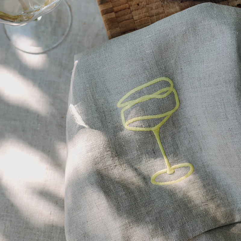 Stoffserviette Schaumweinglas