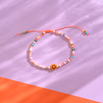 Kinderarmband orange/rosa smile