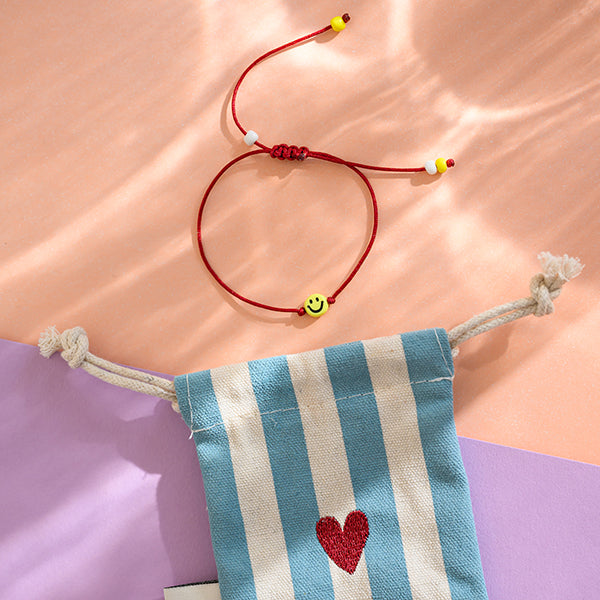 Kinderarmband Smile rot/gelb